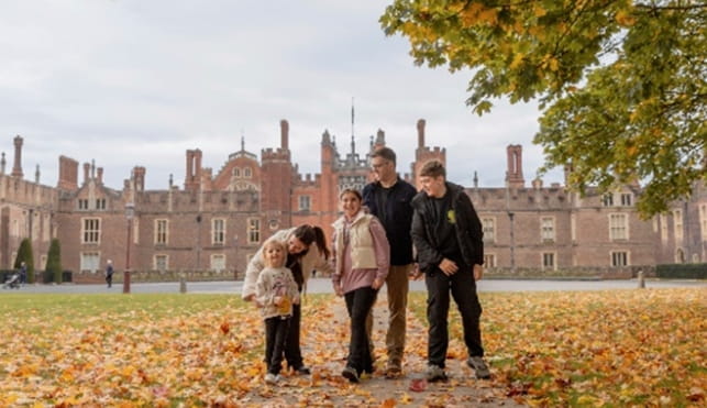 Family outside a historic royal palaces